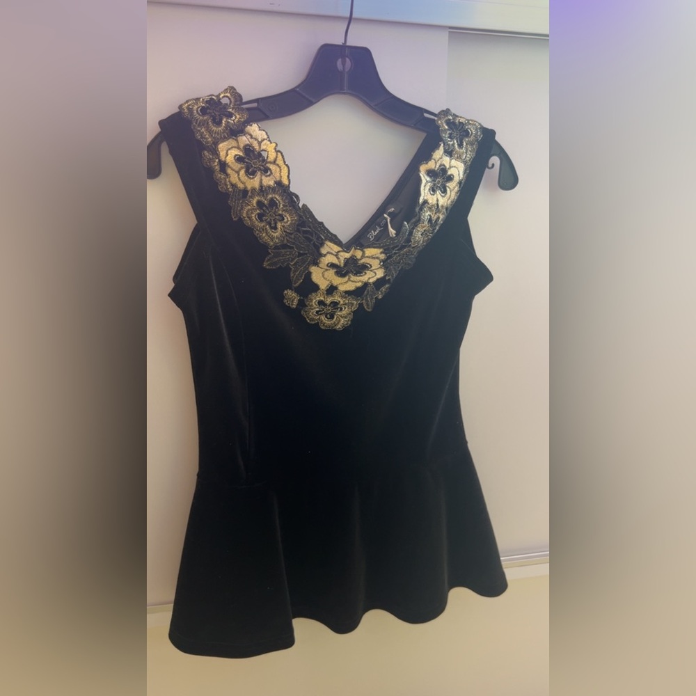 Elegant Black Top with Gold Floral Accents